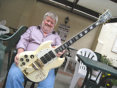 John Halsey with Ollie's guitar